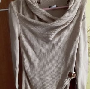 Tan shirt brand new with a side buckle